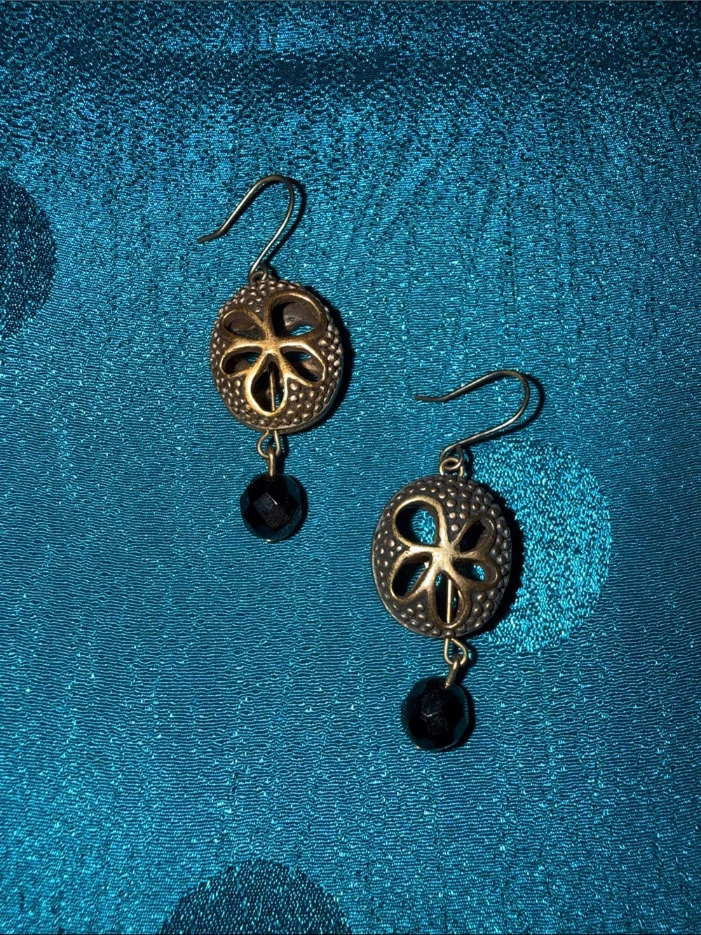 Gold Sand Dollar Dangle Earrings with Black Bead